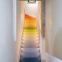 Avant garde Industrial Mews House | Colourful gradient linoleum stairs | Interior Designers